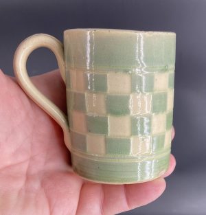 0613:: 1910s Austria, checkerware espresso mug, sea foam green, cylindrical form: 3”H.
