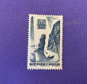 1366:: Stamps, 1947, greenish-blue, St. Pierre et Miquelon 50c, rocky cliff landscape with canoe, uncirculated.